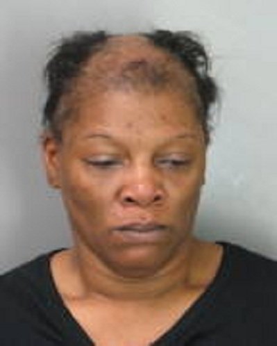 Police said a Cordova mother was caught naked inside a teenage boy's closet