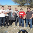 A photograph showing a group of men with guns posing with a bullet-riddled T-shirt containing an image of Barack Obama’s face is to be investigated by the Secret Service, a...