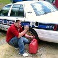 Mental giant poses with hose while siphoning gas from police cruiser ShareJENKINS, Ky. (AP) – There it was on Facebook for all to see – Michael Baker with a gas can, a siphon hose stuck into a police cruiser in eastern...