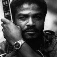 YOU CAN LICK IT…YOU CAN STICK IT…BUT YOU AIN’T DID A DOG GONE THING UNTIL YOU “STAND UP IN IT”: MR. THEODIS EALEY PART I ShareTheodis Ealey, a true “Blues” Legend, learned to play the guitar from his older brother as a toddler. The story goes his first gig in a club he was only...